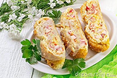 Delicious homemade pie with cheese and surimi Stock Photo