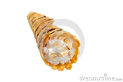 Delicious honeyed waffles, twisted into cones with cream, nuts, chocolate topping isolated on white background Stock Photo