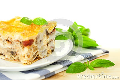 Delicious Italian Lasagna / with fresh basil Stock Photo