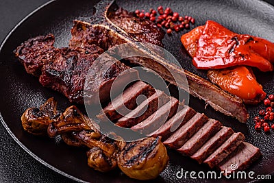 Delicious juicy beef tbone steak with salt, spices and herbs Stock Photo