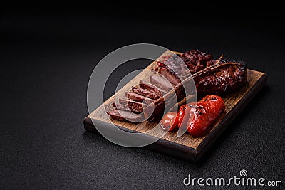 Delicious juicy beef tbone steak with salt, spices and herbs Stock Photo