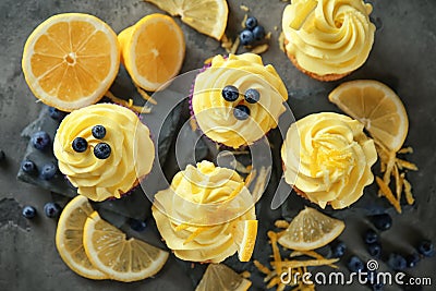 Delicious lemon cupcakes on table, top view Stock Photo