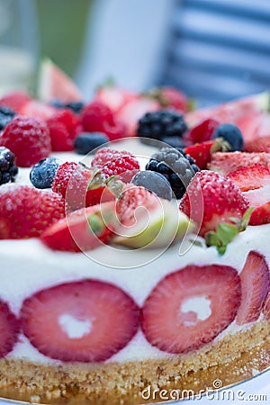 Beautiful fresh yogurt and strawberry cake with summer berries Stock Photo