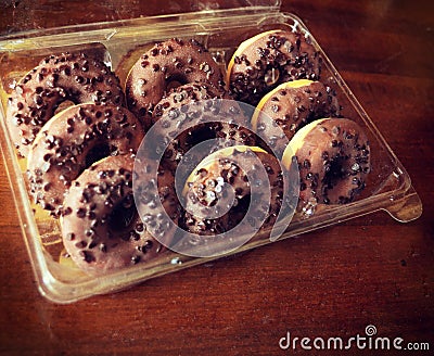 Mini doughnuts with frosty chocolate Stock Photo