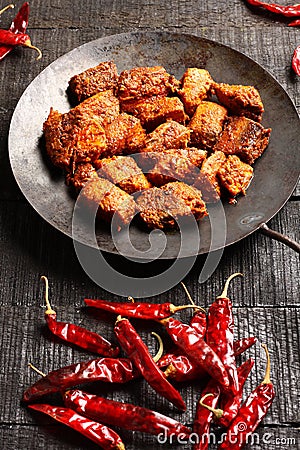 Delicious mutton pepper fry served with red challis, Stock Photo