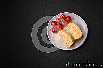 Delicious omelet with milk, spices and herbs cut into large pieces Stock Photo