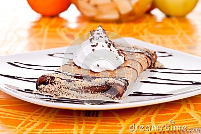 Delicious pancake with chocolate syrup Stock Photo