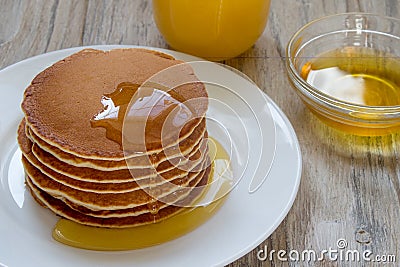 Delicious pancake with organic honey Stock Photo