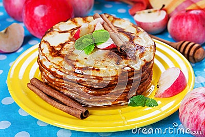 Delicious pancakes, honey, apples, cinnamon Stock Photo