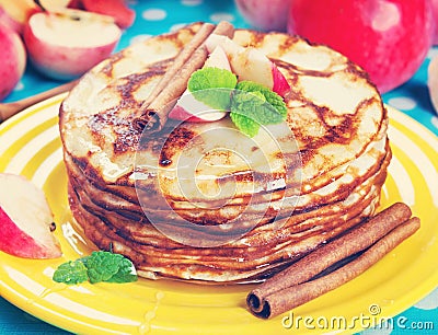 Delicious pancakes, honey apples and cinnamon. Vintage retro hip Stock Photo