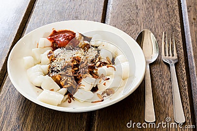 Delicious Penang Chee Cheong Fun with sauces, sesame, fried shallot. Stock Photo