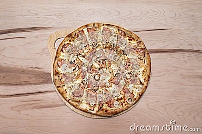 Delicious pizza with prosciutto funghi baked Stock Photo