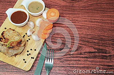 Delicious pork steak on wood food Stock Photo