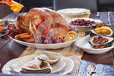 Delicious Roasted Thanksgiving Turkey on Farmhouse Table Stock Photo