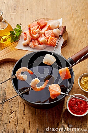 Delicious seafood winter fondue Stock Photo