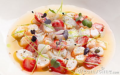 Delicious shrimp ceviche with strawberries, spices and lemon Stock Photo