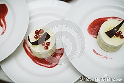 Delicious small cream cakes with chocolate Stock Photo