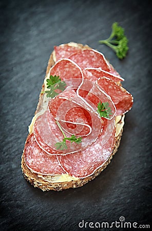 Delicious spicy salami appetizer Stock Photo