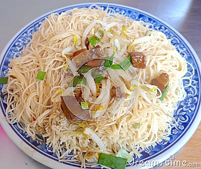 Delicious stir-fried rice noodles Stock Photo
