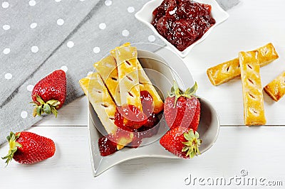 Delicious strawberry fruit and jam and puff pastry stick Stock Photo