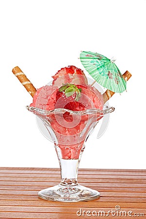 Delicious strawberry ice cream with umbrella Stock Photo