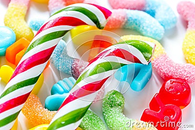 Delicious sugar lollipops on abstract candy background pattern Stock Photo