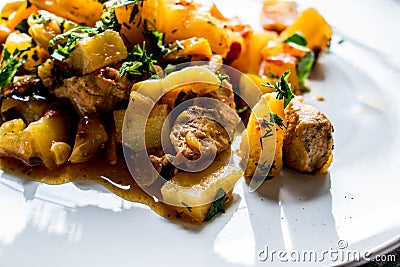 Delicious, summer appetizing stew of vegetables and meat. A fragrant and hot hearty dish. Different interesting tastes. Stock Photo