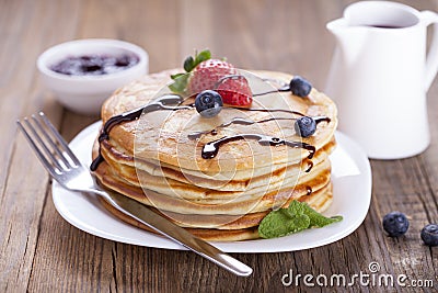 Delicious sweet American pancakes on a plate with fresh fruits Stock Photo