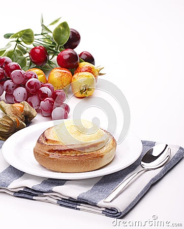 Delicious sweet cream bun Stock Photo