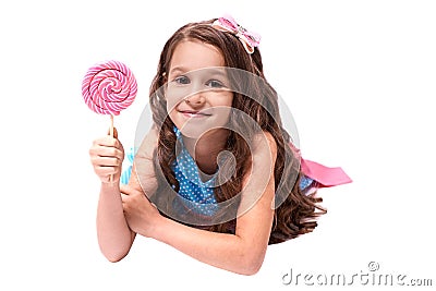 Delicious sweetness. Multicolored lollipops. Little girl Stock Photo