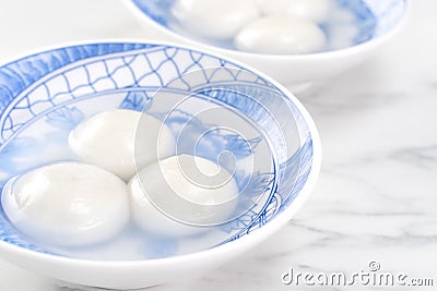 Delicious tang yuan, yuanxiao in a small bowl. Asian traditional festive food rice dumplings ball with stuffed fillings for Stock Photo