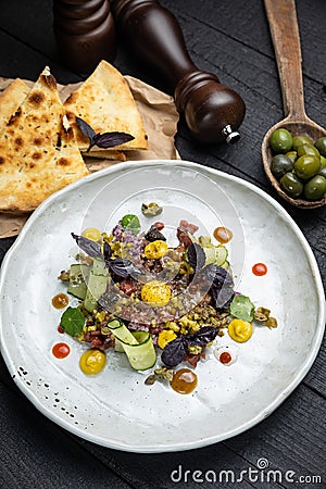 Delicious tartar in an Italian restaurant Stock Photo