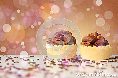 Delicious tasty homemade cakes with bokeh light background Stock Photo