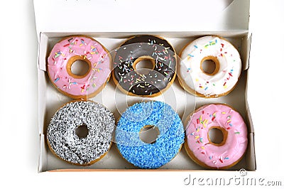 Delicious and tempting box full of donuts with different flavours and toppings sugar addiction concept Stock Photo