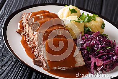 Delicious traditional German dinner Sauerbraten - slowly stewed Stock Photo