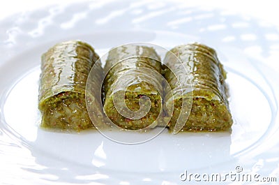 Delicious Turkish sweet, wrapped green pistachio nuts ( Sarma ) Stock Photo