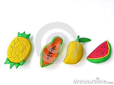 Delicious variety fruit, colorful plasticine clay, sweet pineapple banana mango watermelon dough Stock Photo