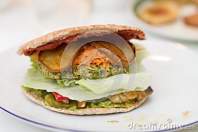 Delicious vegan burger on white plate Stock Photo