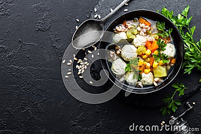 Delicious vegetable soup with chicken meatballs and pearl barley Stock Photo