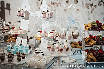 A delicious wedding. Candy bar for a banquet. Celebration concept. Stock Photo