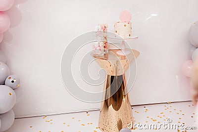 Delicious wedding reception. Birthday Cake on a background balloons party decor. Copy space. Candy bar Stock Photo