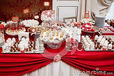 Delicious wedding reception candy bar dessert table. Stock Photo