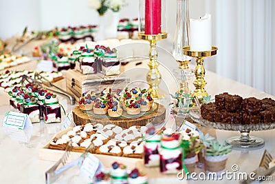 Delicious wedding reception candy bar dessert table Stock Photo