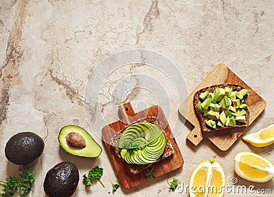 Delicious wholewheat toast with avocado slices. Healthy food Stock Photo