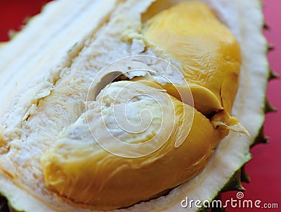 Yellow Durain Fruits showing at a table Stock Photo