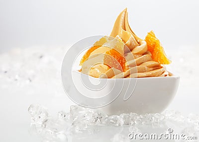 Delicious Yellow Frozen with Tasty Toppings Stock Photo