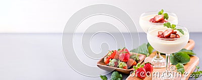 Delicous and nutritious double color colour strawberry desserts with mint and diced sarcocarp topping with airy blue Stock Photo