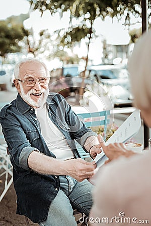 Delighted bearded man being in a great mood Stock Photo