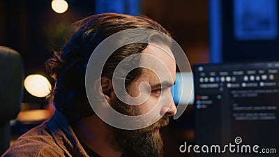 Delighted software programmer having burst of emotion after removing code bugs Stock Photo