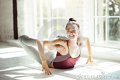 Delighted talented dancer taking pleasure in a workout Stock Photo